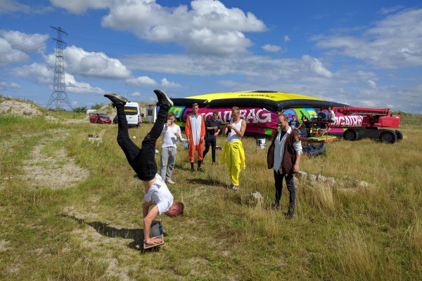 Smoare doing a handstand while riding on our Onewheel