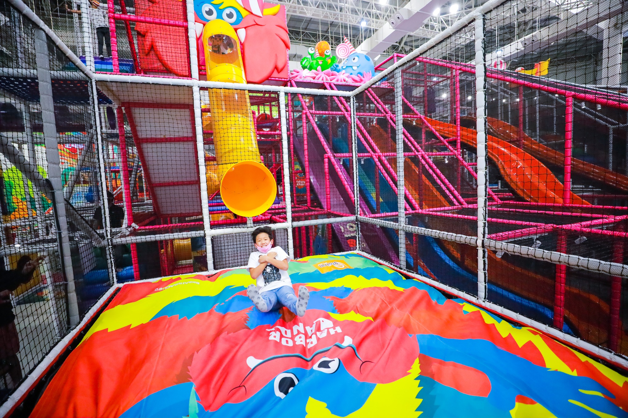 A child landing on an air bag at Harbor Land fun park.