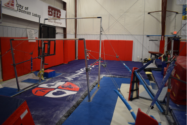 Splitbars over Gym Pit airbag.